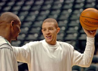 (042905 - INDIANAPOLIS, IN) The Celtics' Delonte West, right, chats with teamate Justin Reed during practice at Conseco Fieldhouse in Indianapolis Friday. (042905celticsdg - Staff Photo by David Goldman. Saved in Photo SAT/FTP)