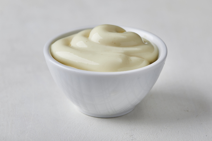 Mayonnaise in a small ceramic bowl