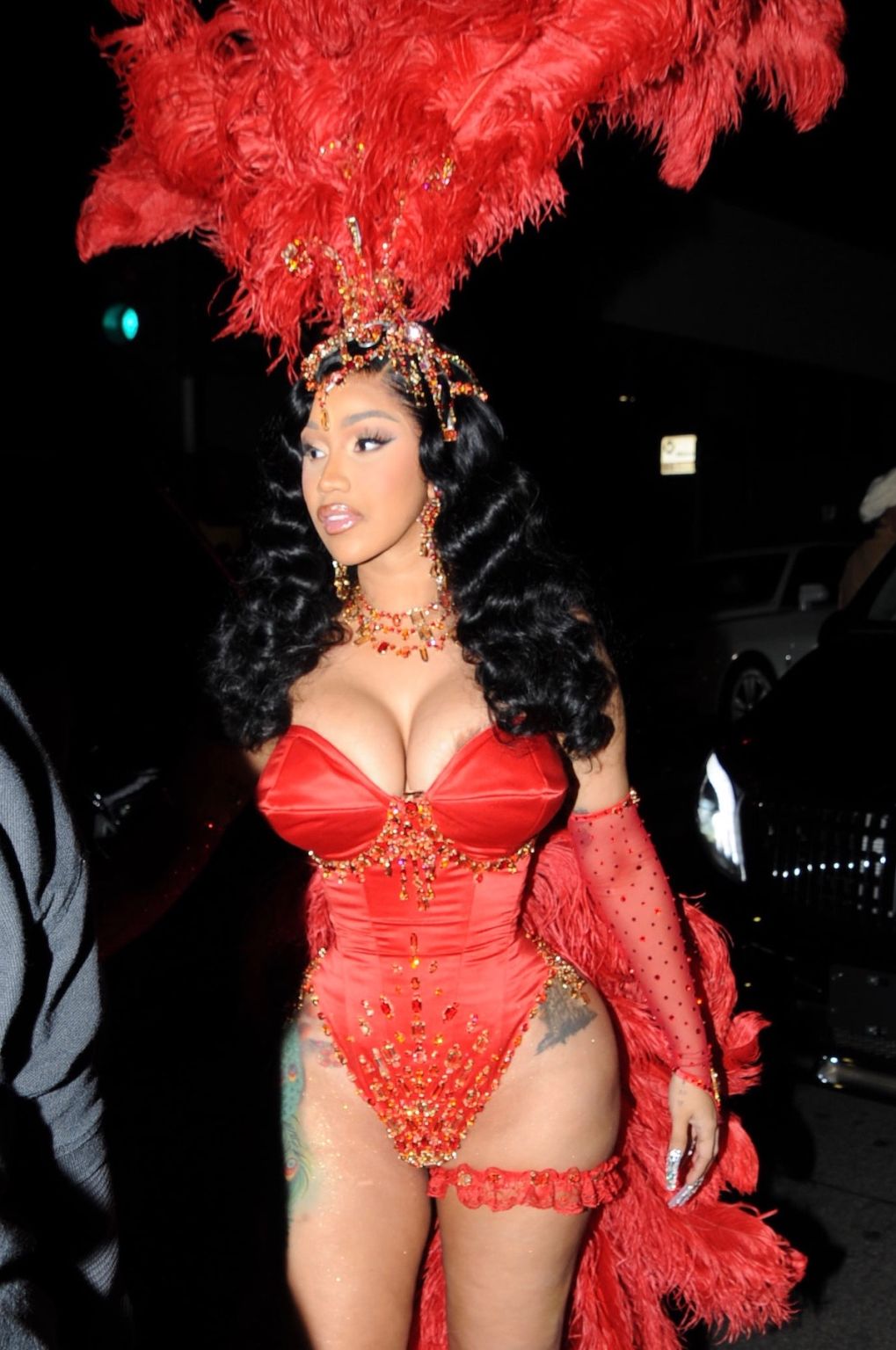 Cardi B Put On A Busty Display In Red Feathered Birthday Look