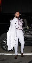 Drake wears lavender suit for birthday party at Sexy Fish