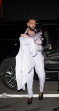 Drake wears lavender suit for birthday party at Sexy Fish