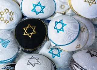 Traditional jewish hat called kippah sold on the market