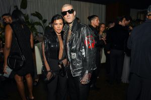 Kourtney Kardashian and Travis Barker attend GQ Men of the Year Party
