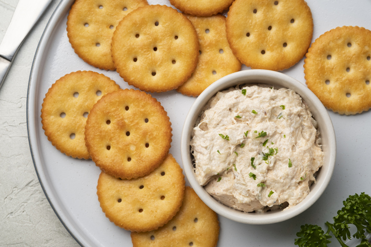 Tuna spread in white bowl with Butter cracker
