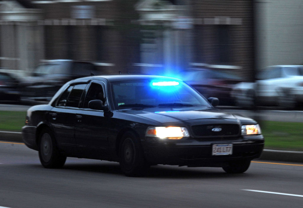 (Boston, MA, 07/21/14) An unmarked police cruiser speeds along Blue Hill Avenue on Monday, July 21, 2014. Staff photo by Christopher Evans