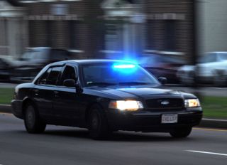 (Boston, MA, 07/21/14) An unmarked police cruiser speeds along Blue Hill Avenue on Monday, July 21, 2014. Staff photo by Christopher Evans