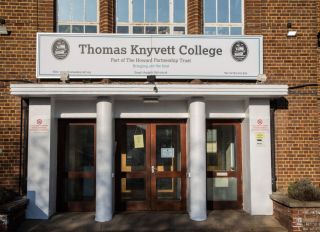 The exterior view of Thomas Knyvett College sign...