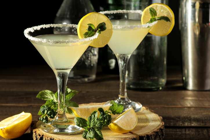 Margarita cocktail, Alcoholic drink, margarita cocktail with lemon and mint and salt on a wooden table. bar. bar stock and accessories.