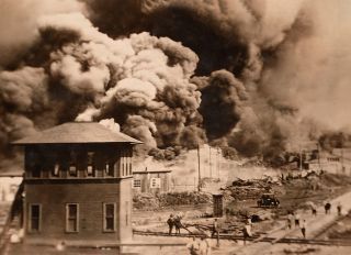Buildings burning during Race Riots, Greenwood District, Tulsa, Oklahoma, USA, Unidentified Artist, June 1921