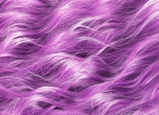 Texture of purple wavy hair coloring and styling