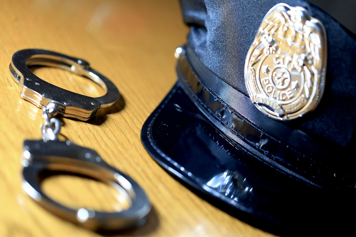 Patrol officers cap and handcuffs