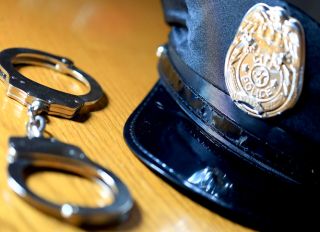 Patrol officers cap and handcuffs