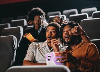 People are watching a movie at the movie theatre