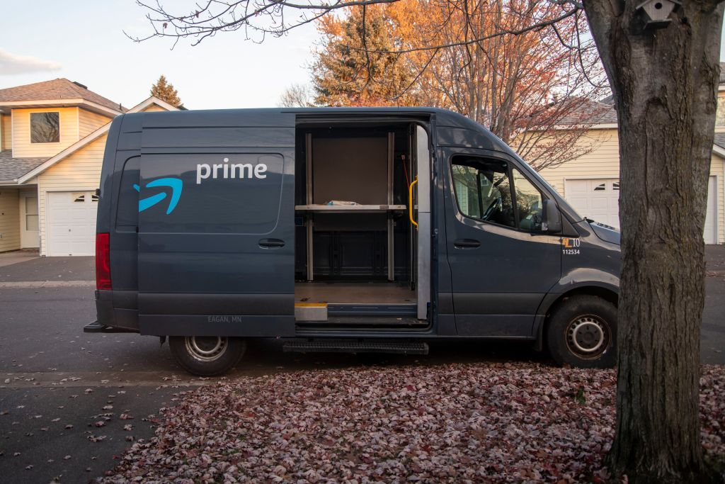 Amazon Prime delivery truck making neighborhood deliveries.