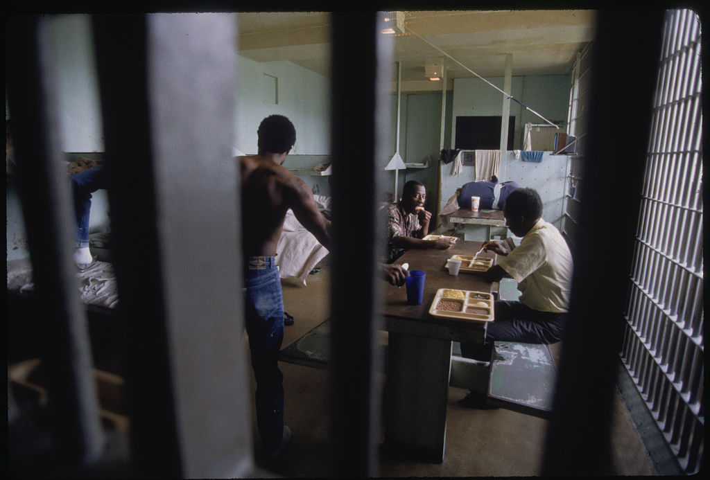 Coahoma Jail Inmates with Their Meals Behind Bars