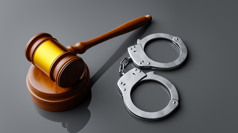Sentencing concept for crime with handcuffs and judgment baton,3d rendering