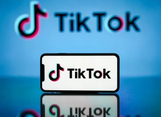 In this photo illustration, the TikTok logo is seen...