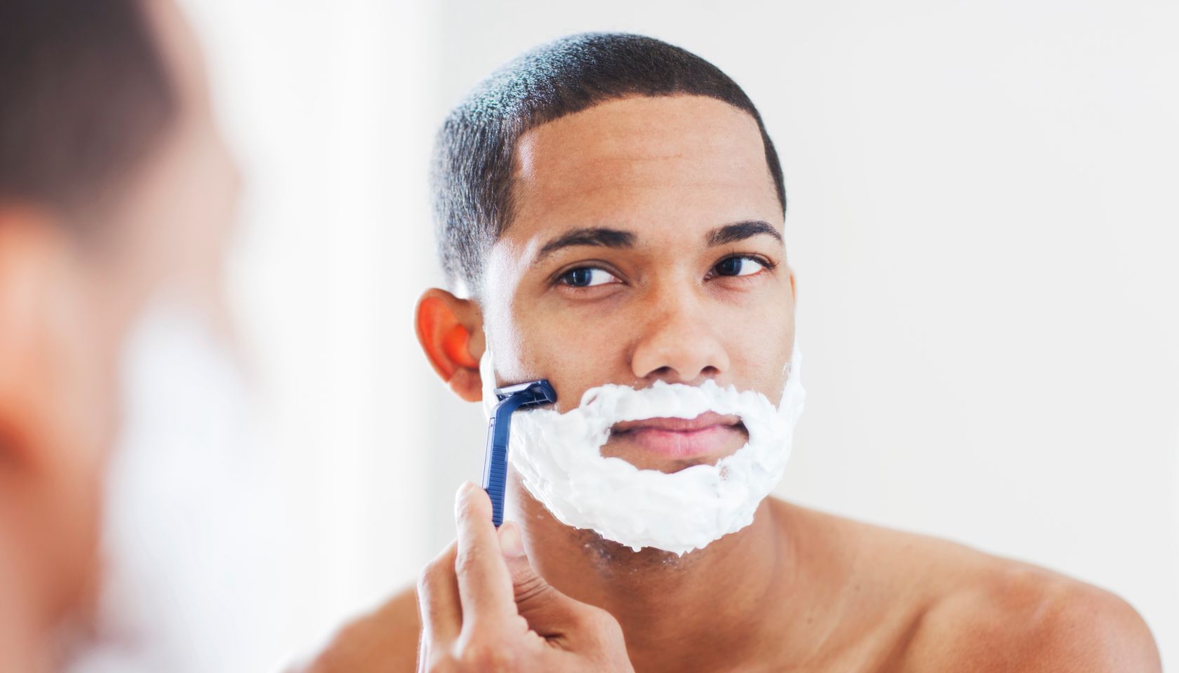 Black man shaving image