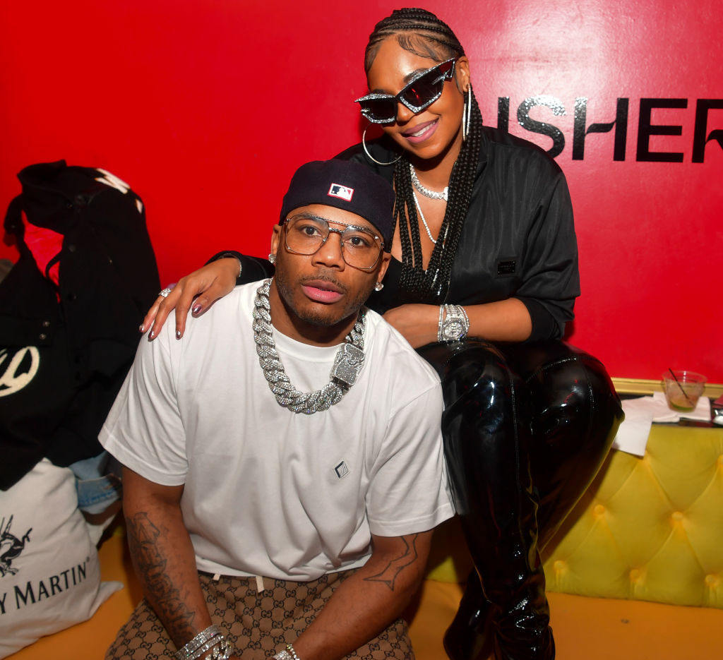 Nelly and Ashanti attend Usher's "Coming Home" Album Release Event