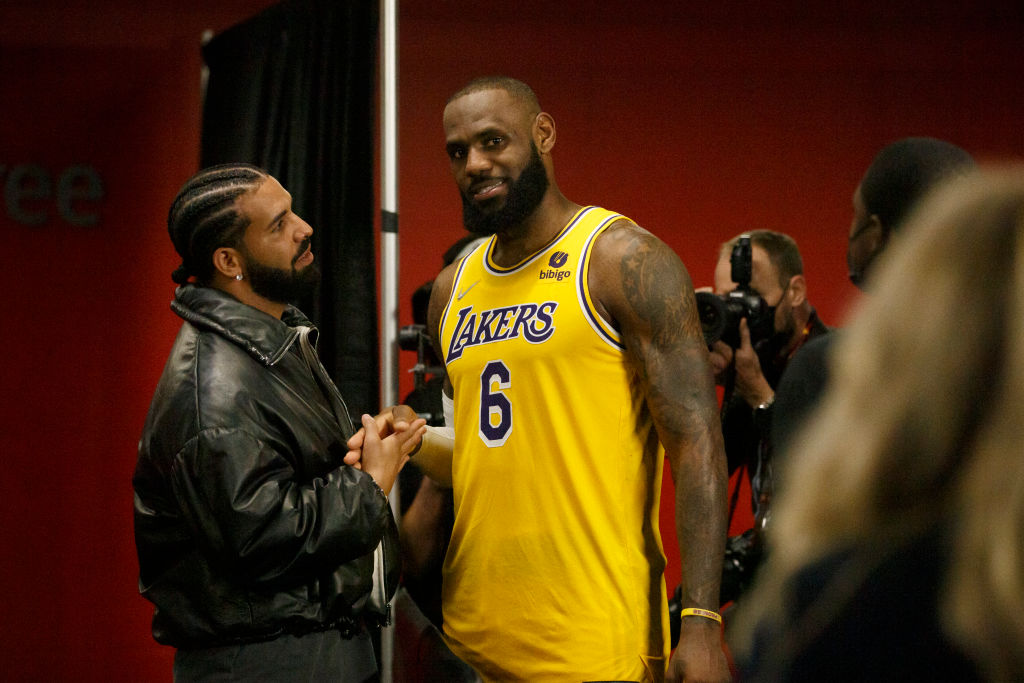 Drake and LeBron James in the locker room at the Los Angeles Lakers v Toronto Raptors