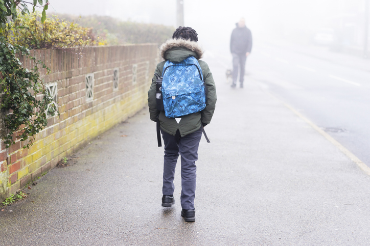 Boy walking to school
