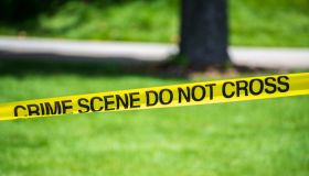 Crime Scene Tape in Public Park Area