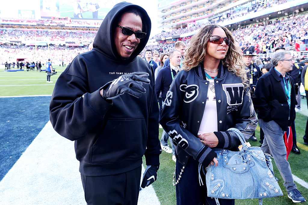 Sideline Scene-Stealers: Jay-Z Brings Daughters Blue Ivy & Rumi To The Super Bowl For An Adorable Football Family Outing