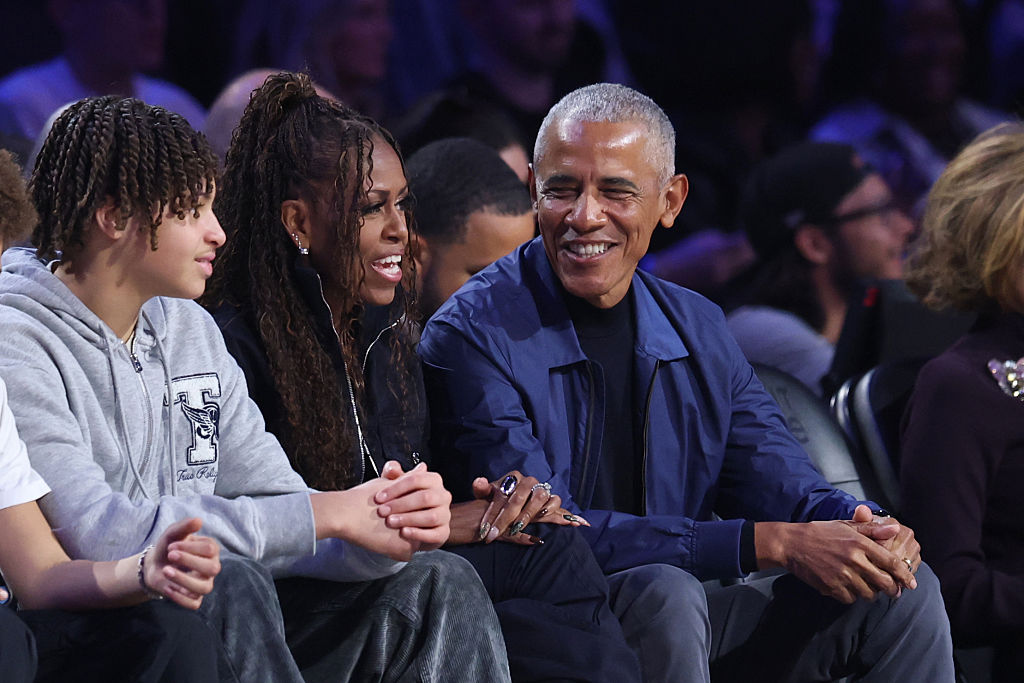 Unbothered Barack Obama Shakes Off Trump’s ‘Clown Show’ Ape Video, Attends All-Star Game With Forever FLOTUS & Daughter Sasha