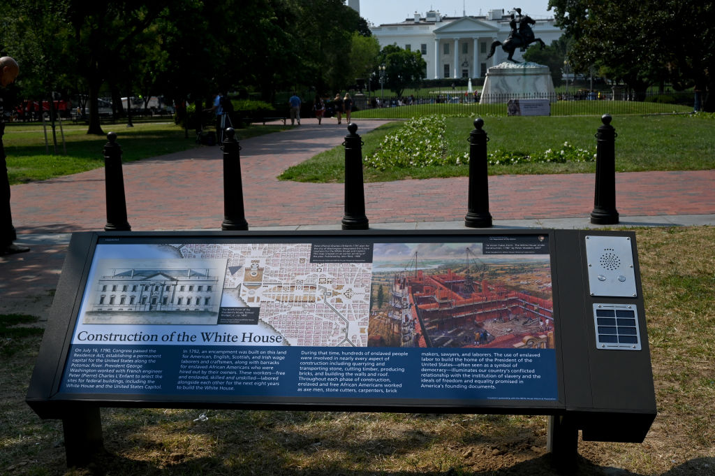 Plaques dedicated to Jackie Kennedy, enslaved that built White House, and protesters unveiled