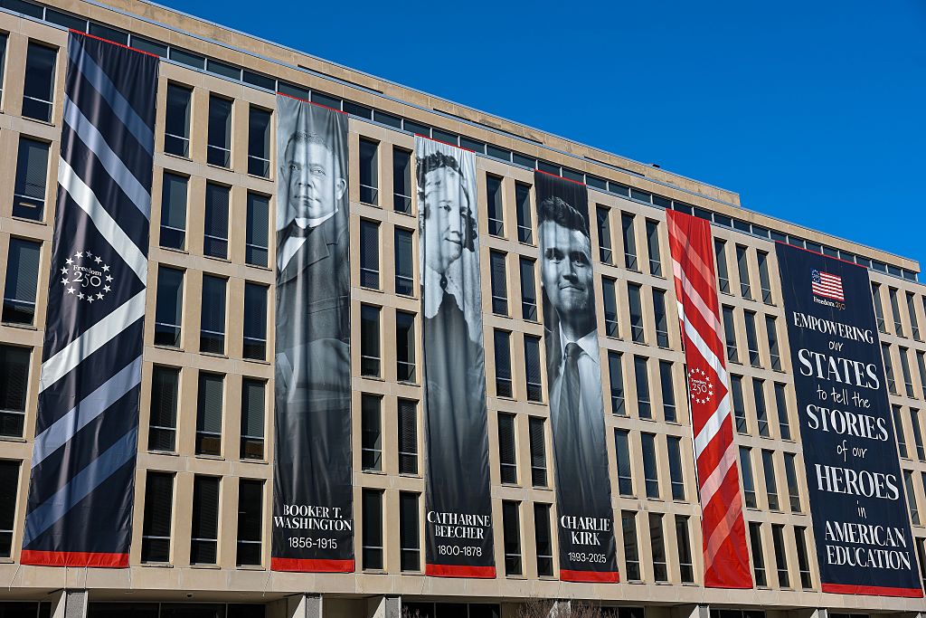 GTFOHWTBS: Charlie Kirk’s Photo Placed Next To Booker T. Washington Outside Dept. Of Education Despite Calling College ‘Scam’