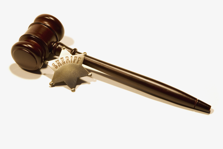Sheriff's Badge and gavel