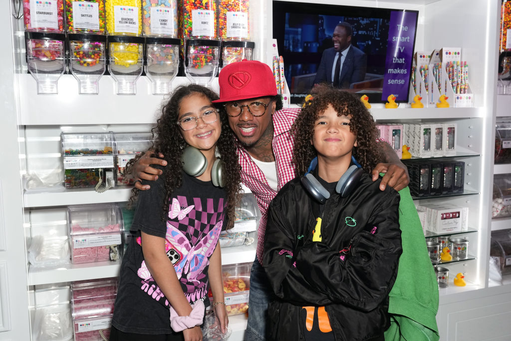 Moroccan Cannon, Nick Cannon and Monroe Cannon attend Natti Natasha & Nick Cannon Host Sugar Factory In Times Square