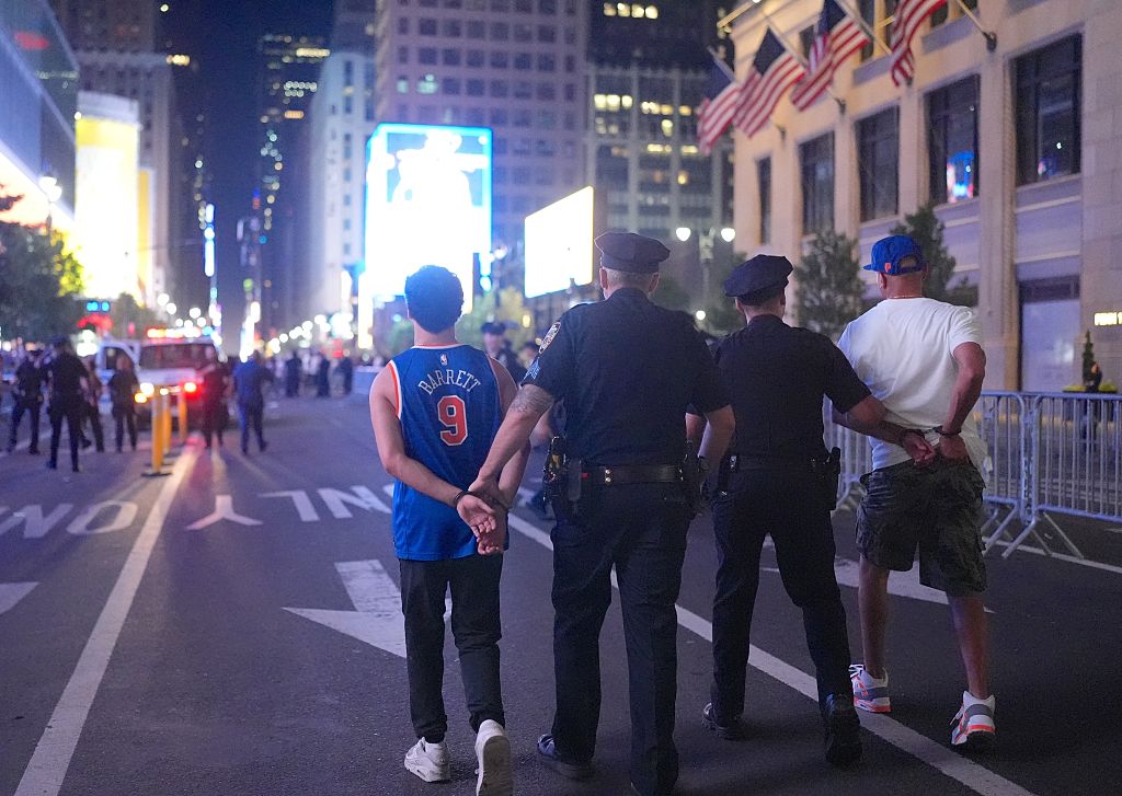 Knicks fans in New York City celebrate after their team's NBA Finals Game 2 win