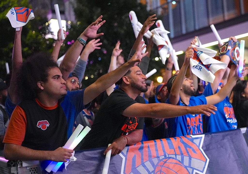 Knicks fans celebrate after the Knicks win Game 1 of the NBA Finals against the San Antonio Spurs