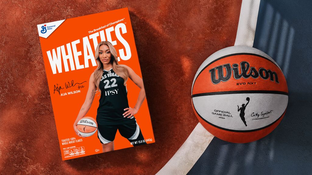 A basketball and a box of Wheaties cereal featuring a woman in a basketball jersey with the number 22.