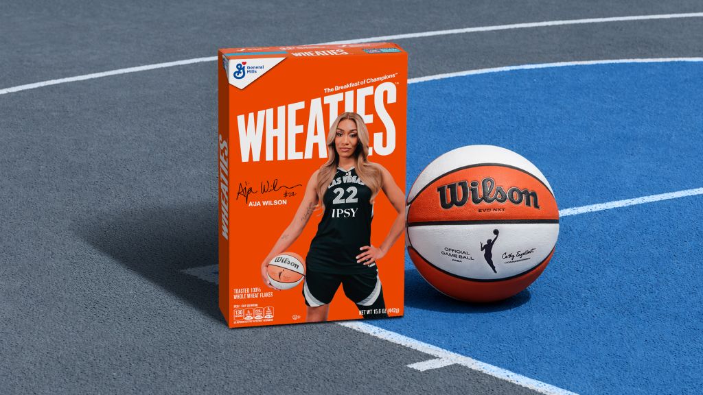 A Wheaties cereal box featuring a basketball player wearing a jersey with the number 22 and the text "IPSY", along with a Wilson basketball on a basketball court.