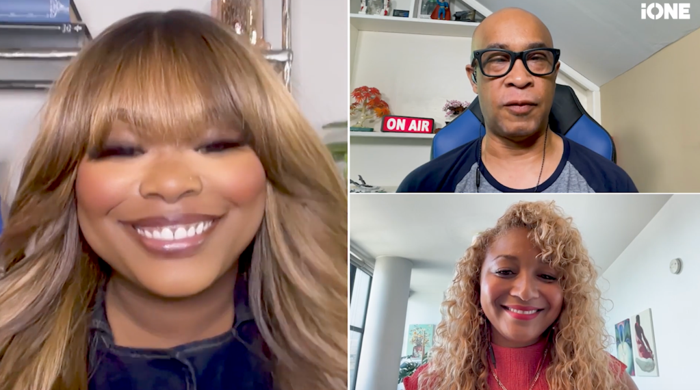 Three people in a video call: a smiling woman with blonde hair, a man wearing glasses, and a woman with curly hair.