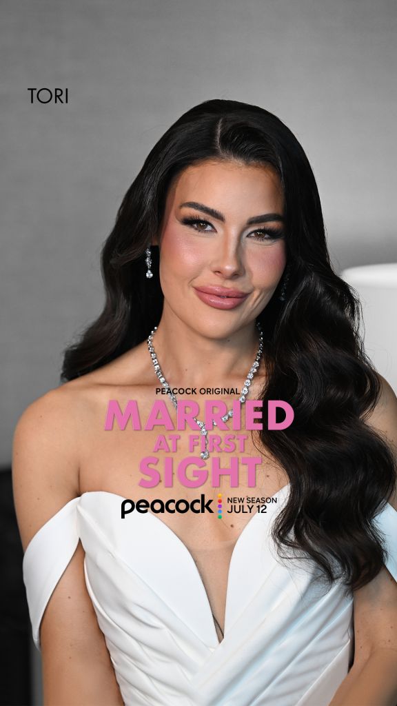 A woman with long dark hair wearing a white dress and jewelry poses for a portrait. The text "TORI" and "MARRIED AT FIRST SIGHT" with the Peacock logo are displayed.