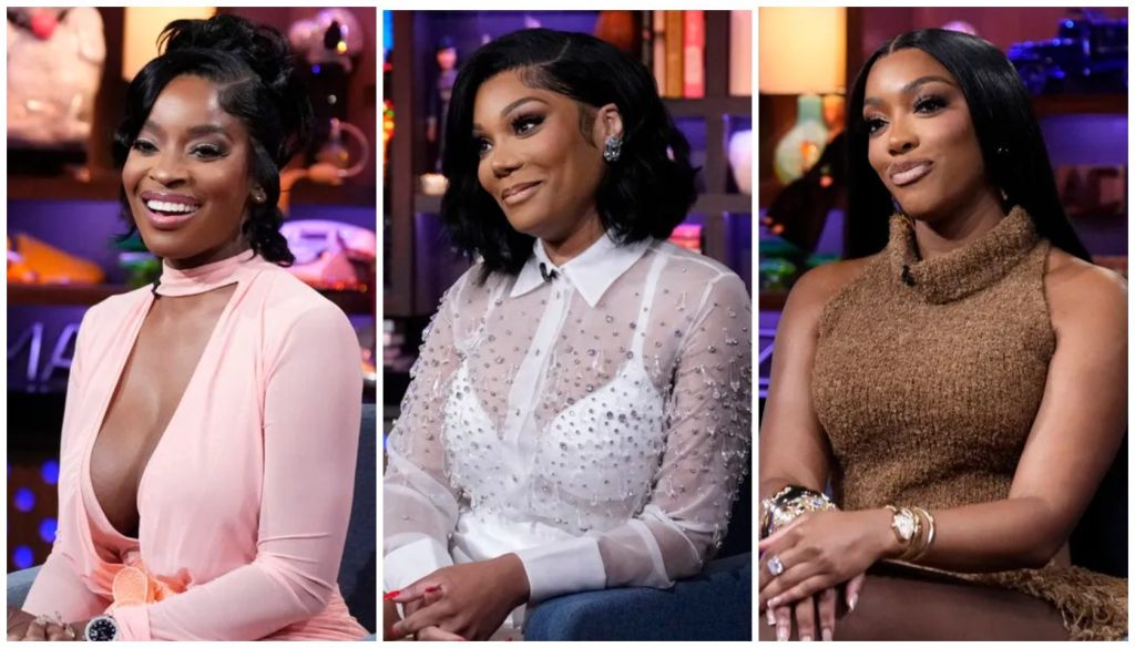 Three smiling Black women in glamorous outfits, one in a pink dress, one in a white sequined blouse, and one in a tan furry sweater.