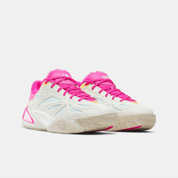 Pair of bright pink and white athletic shoes with a wavy, textured design.
