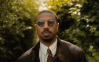 Crime Pays Handsomely! Impeccably Suited Michael B. Jordan Sends Social Media Into Swoonlivion Over Delectably Debonair Demeanor In ‘The Thomas Crown Affair’ Teaser Trailer
