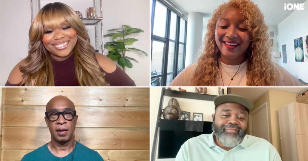 Four people in a video call, smiling and conversing. The people have diverse hairstyles and appearances. The background includes plants, artwork, and wooden paneling.