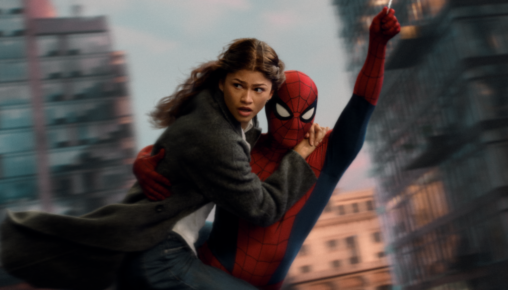 A person in a red and blue Spider-Man costume swinging through the air, with a woman in a black coat clinging to them.