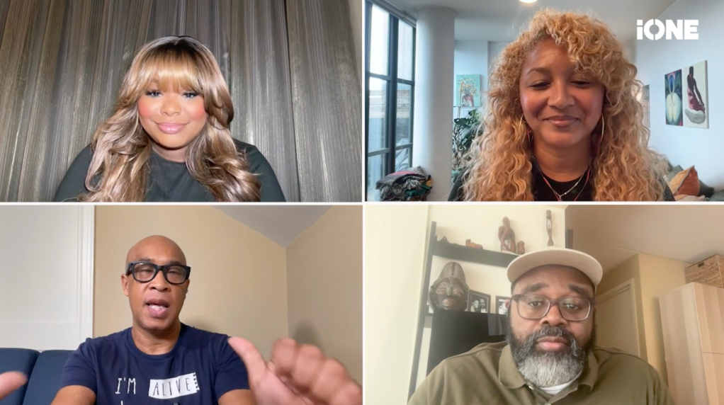 Four people in a video call, including a woman with long curly hair, a man with a beard, and two other individuals.