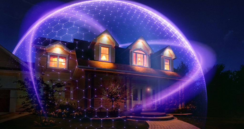 A large, glowing purple dome surrounds a stately, illuminated house at night, with a starry sky in the background.