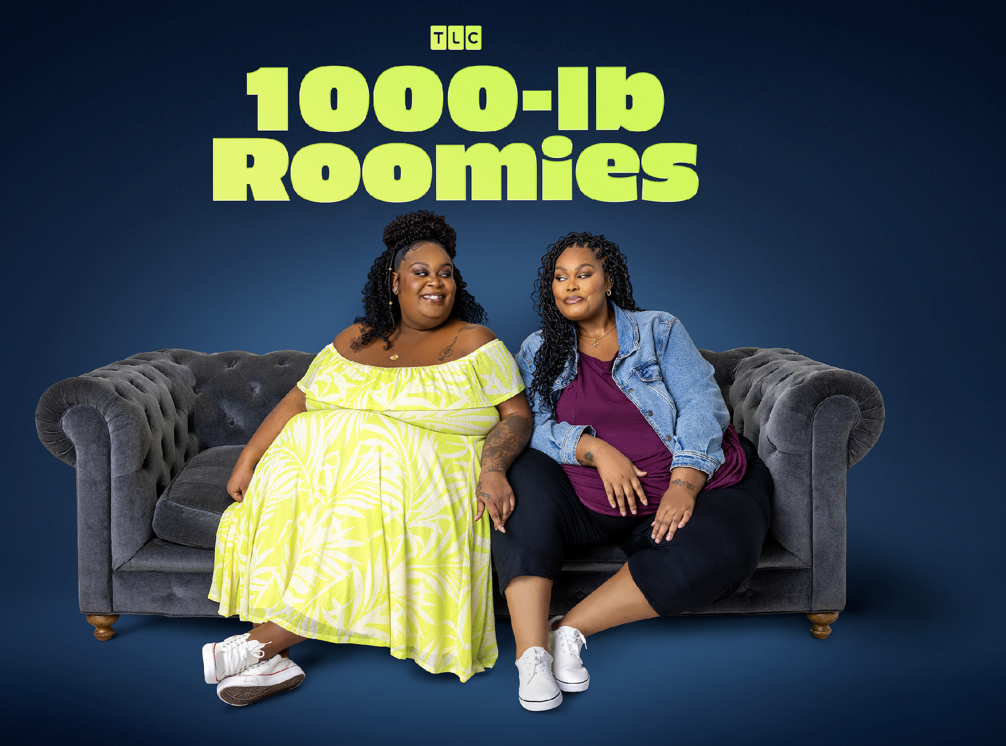 Two women sitting on a gray couch, one wearing a yellow off-the-shoulder dress and the other wearing a purple top and denim jacket. Text above reads "TLC 1000-lb Roomies".